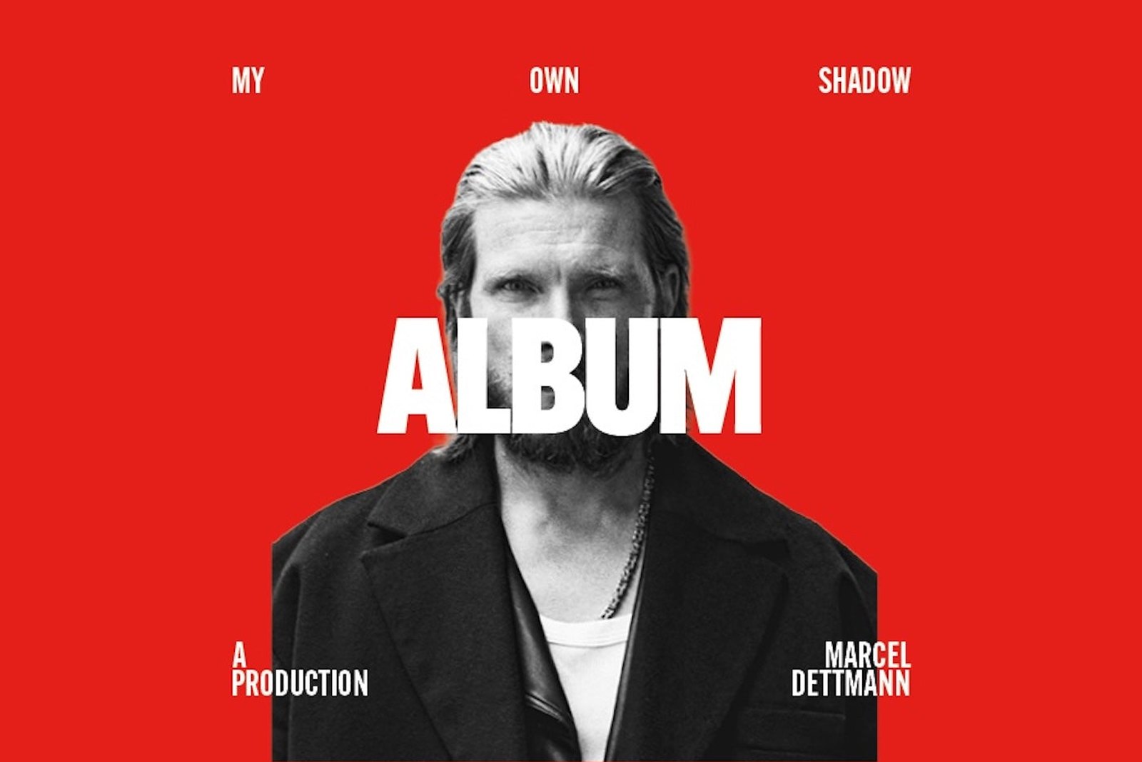 Official My Own Shadow: Album cover art, a black and white portrait of Marcel Dettmann on a flat red background with the word ALBUM across his face
